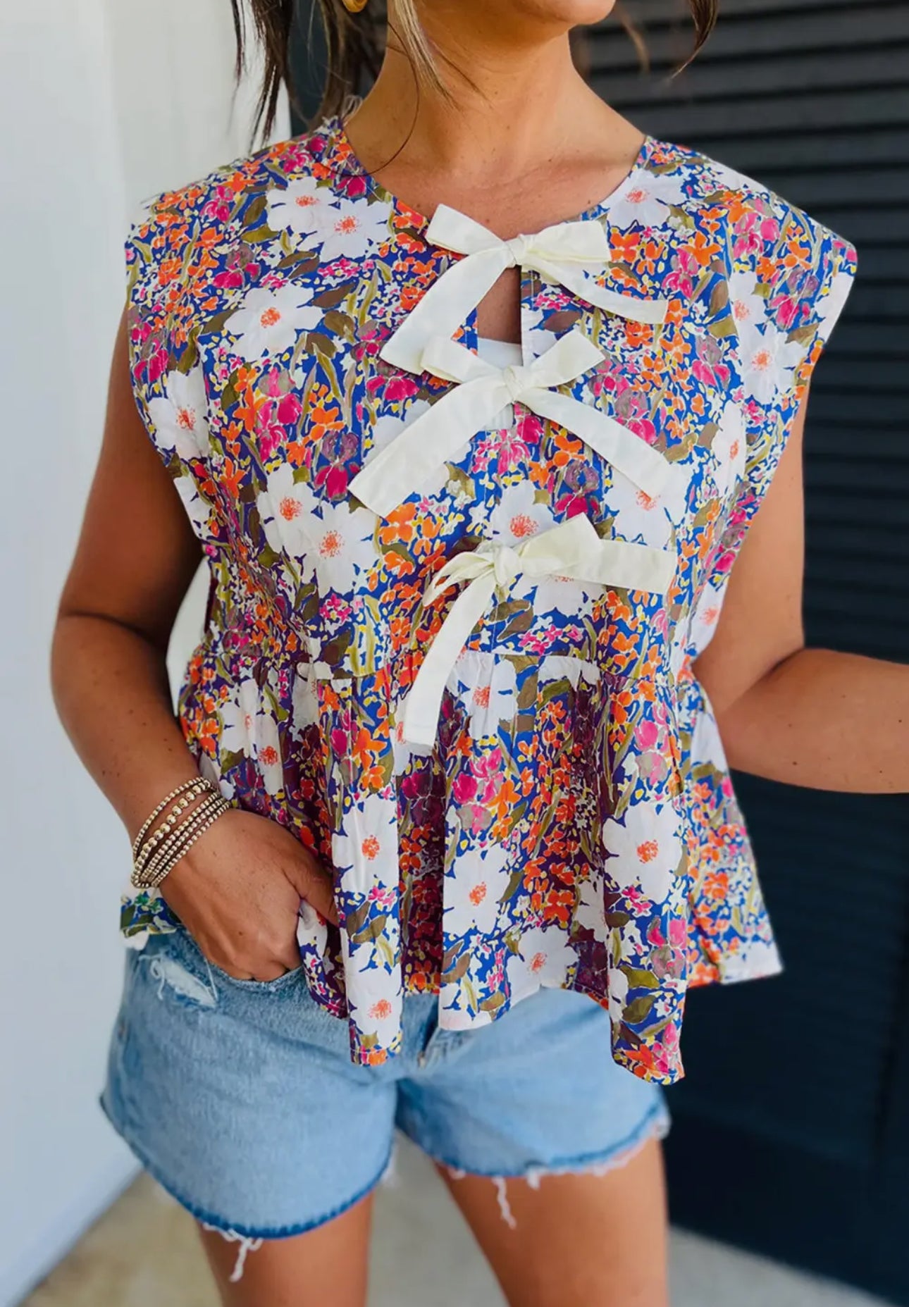 Bow front tie top
